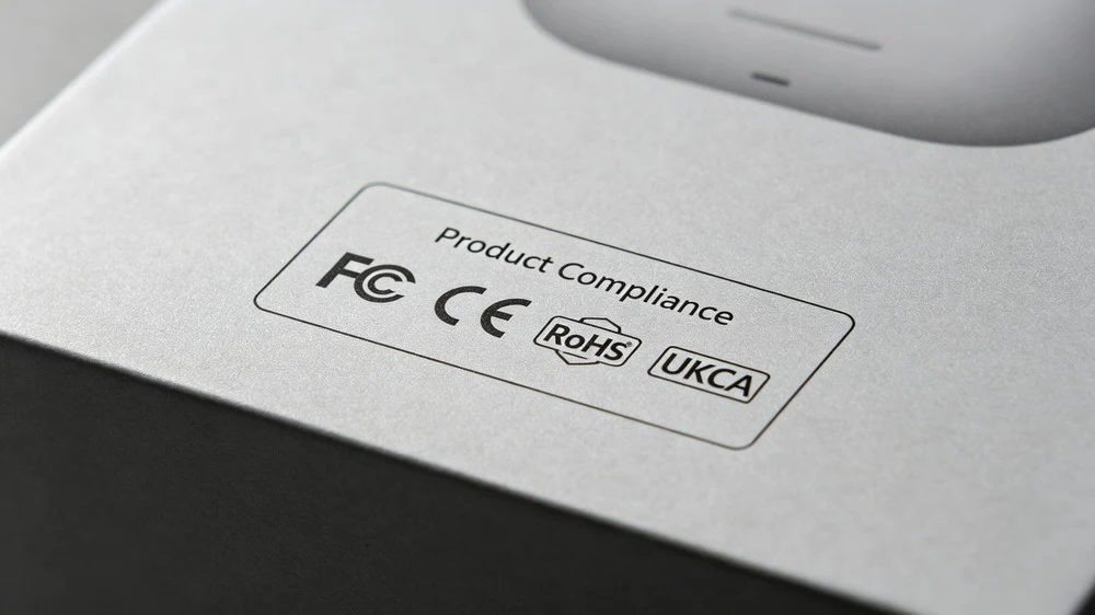 earbuds packaging with FCC CE RoHS UKCA certification marks